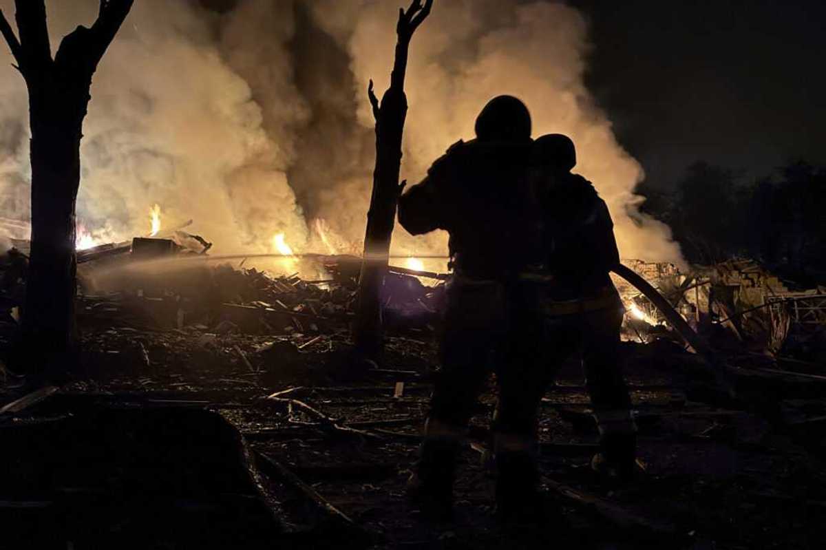 Ukrainian rescuers at night