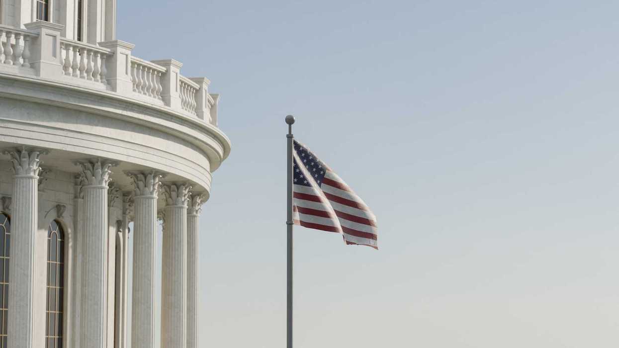 United States Capitol building with US flag