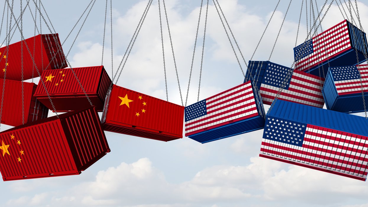 USA China trade war and American tariffs as opposing cargo freight containers in conflict as an economic and diplomatic dispute over import and exports concept as a 3D illustration.