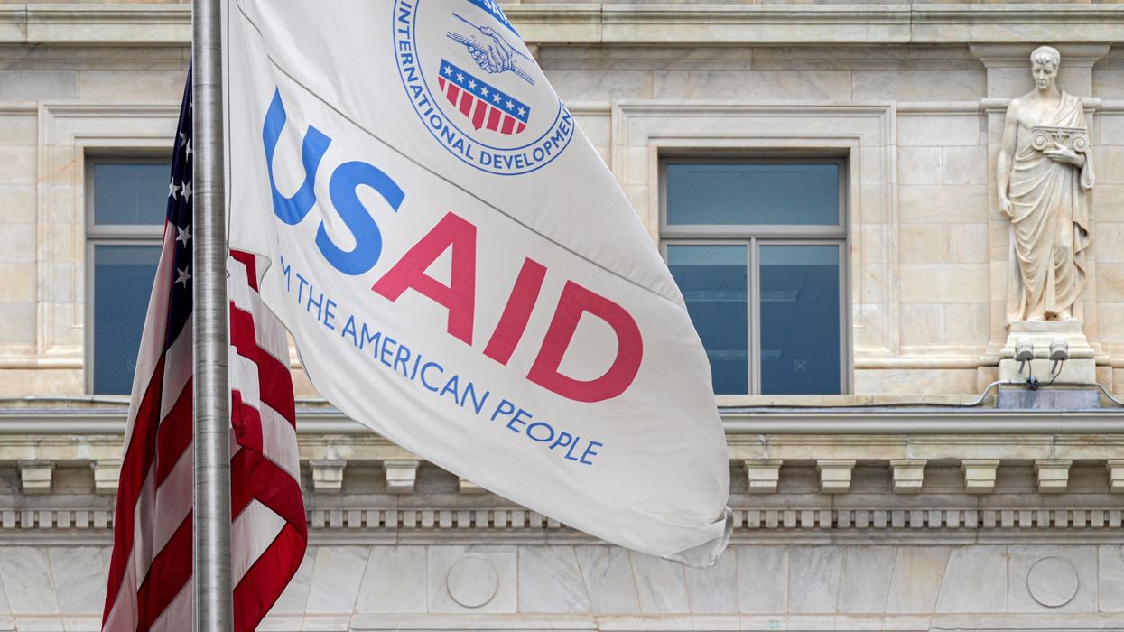 USAID flag outside a building