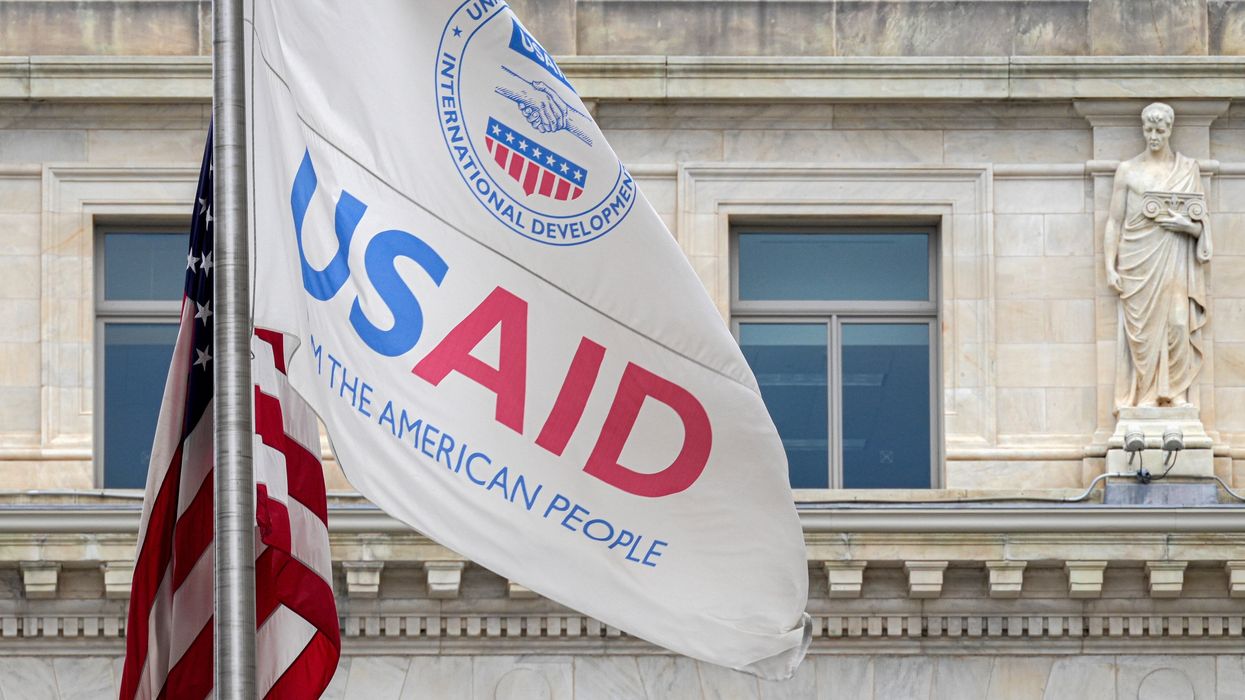 USAID flag outside a building