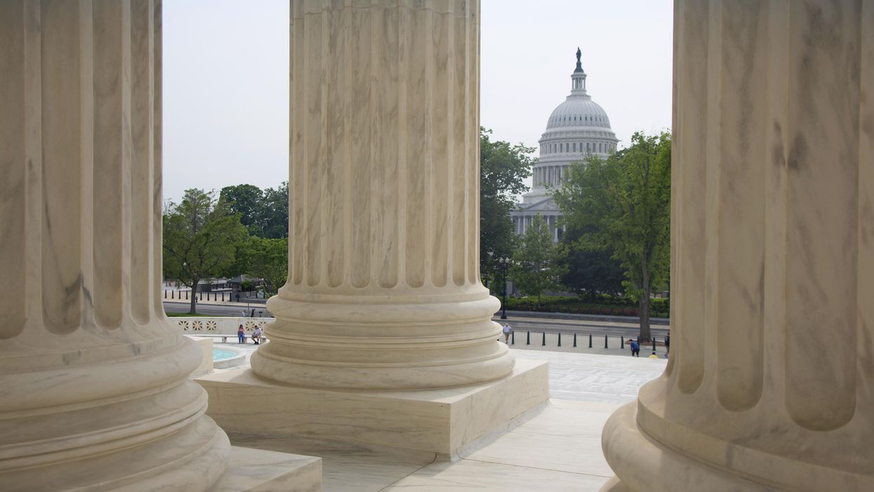 View of the Capitol through columns