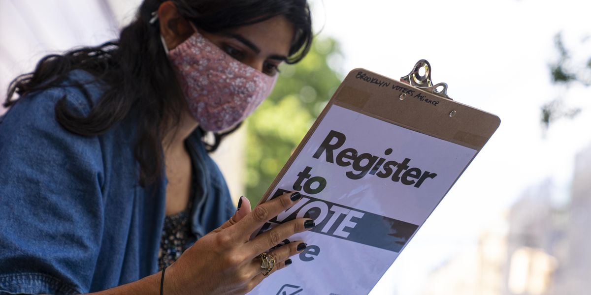 Volunteer registering people to vote