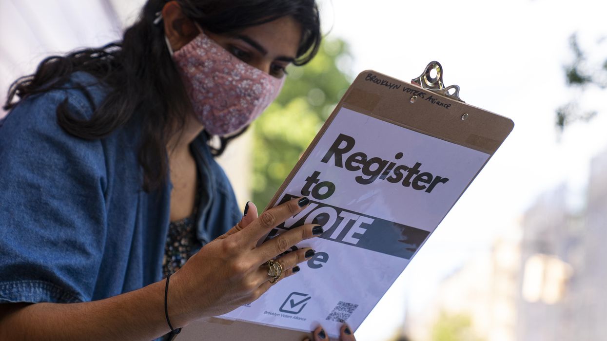 Volunteer registering people to vote