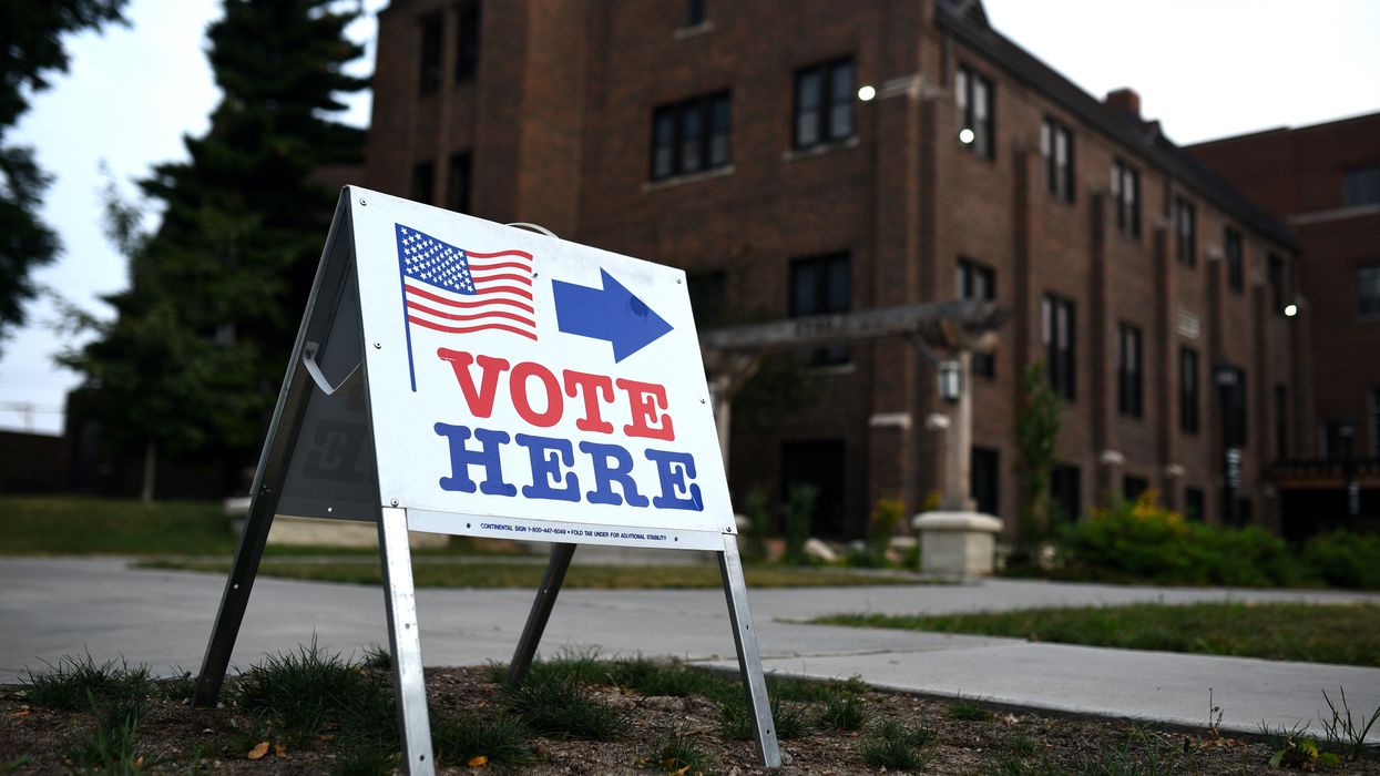 "Vote Here" sign outside a polling location