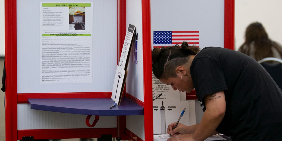 Voter filling out a ballot