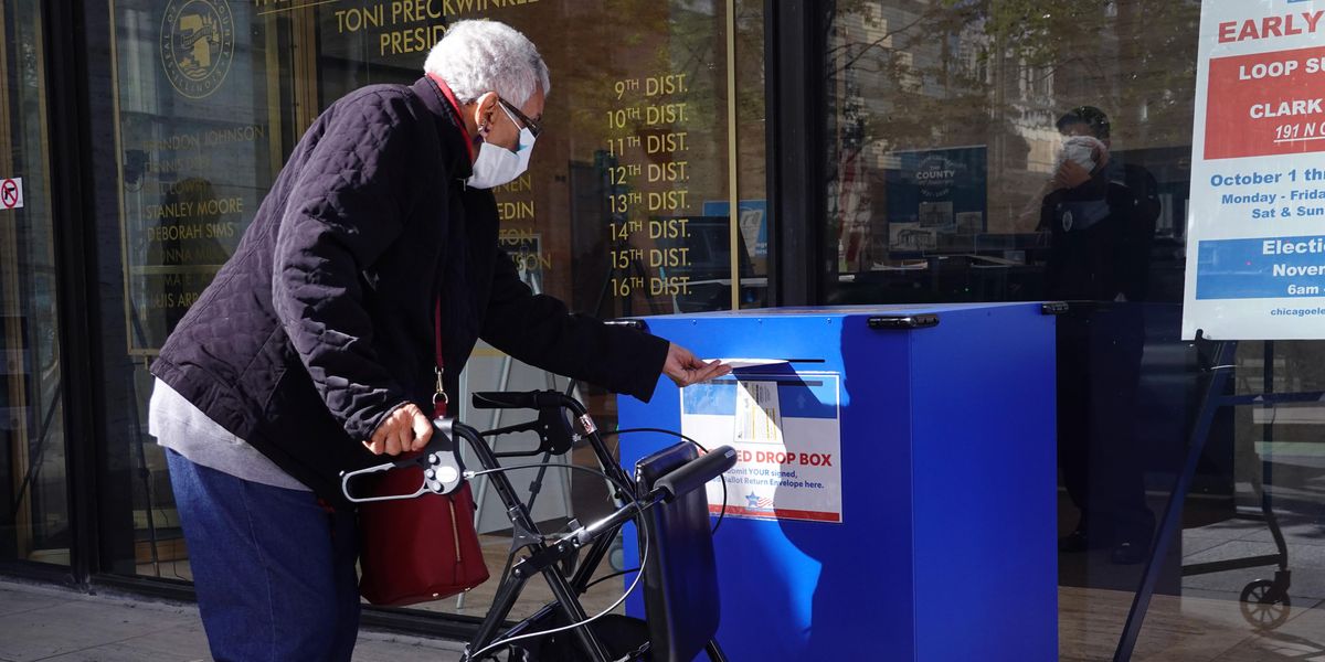 Voter using a drop box