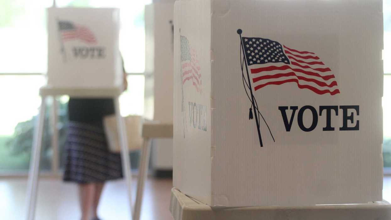 Voting booths stand ready for use in a U.S. election.