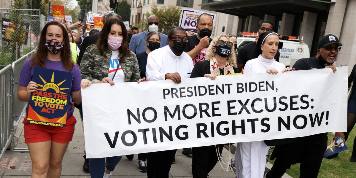 Voting rights activists rally near the White House on Oct. 5.,