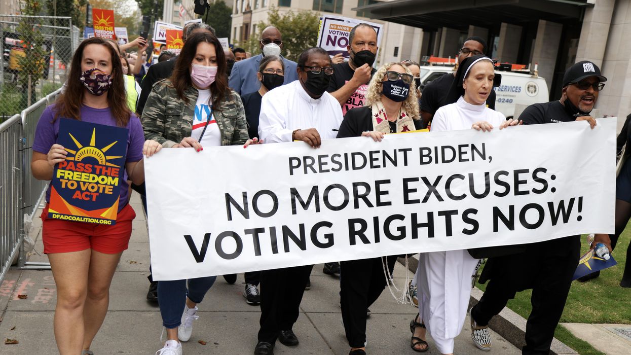 Voting rights activists rally near the White House on Oct. 5.,
