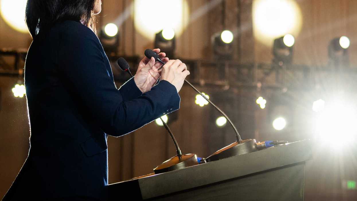 Woman at the podium
