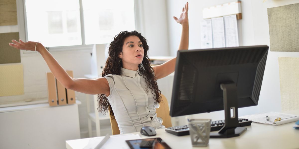 Woman confused at desk