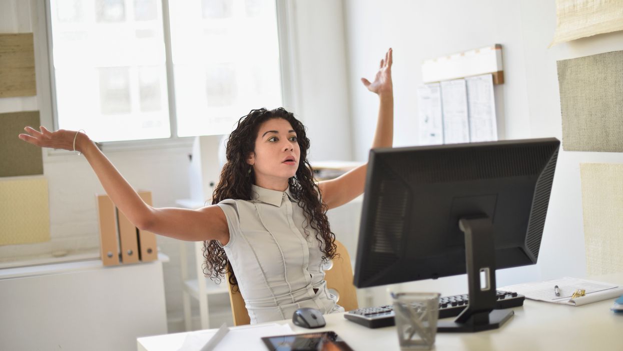 Woman confused at desk