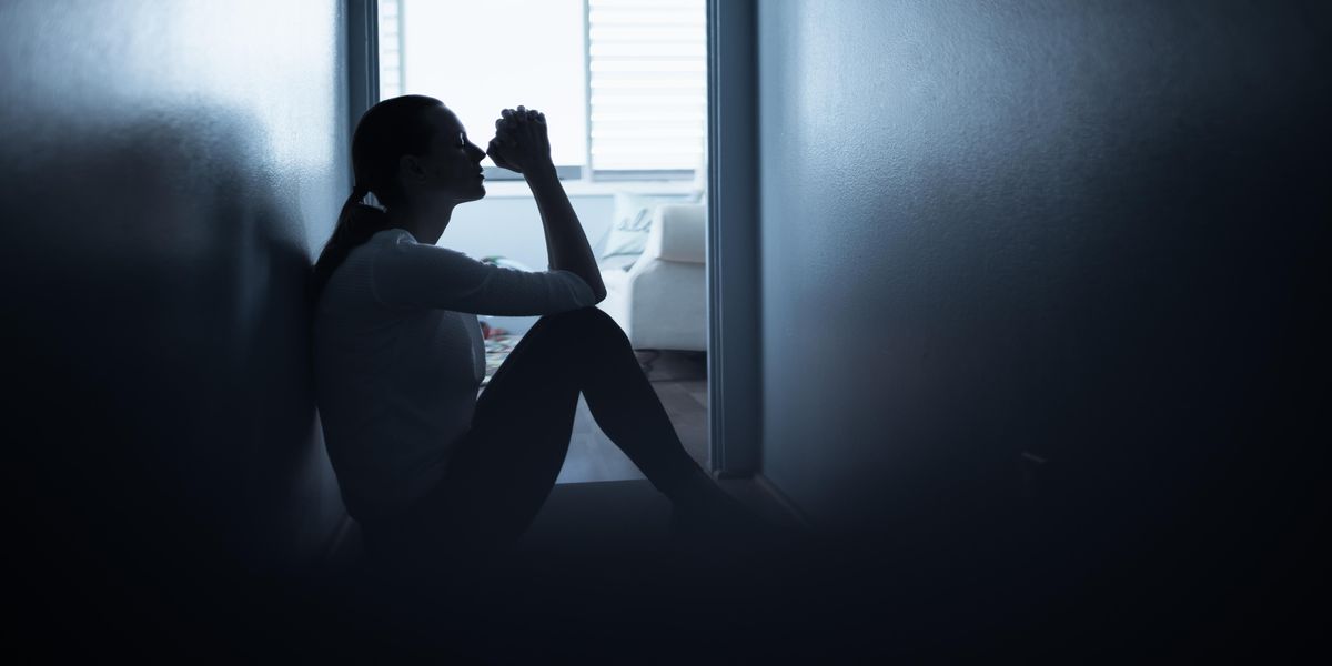 Woman saying a prayer