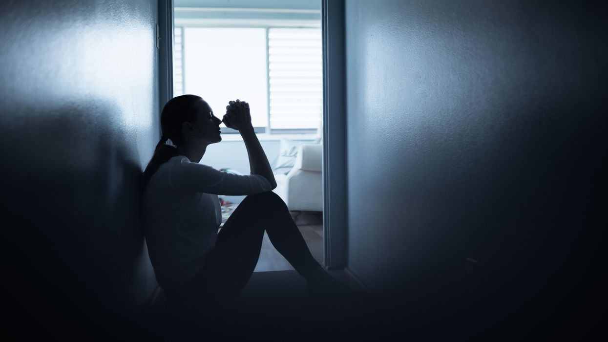 Woman saying a prayer