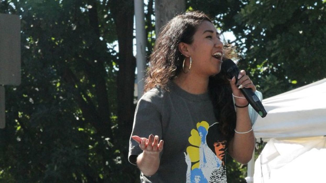 Woman speaking with a microphone