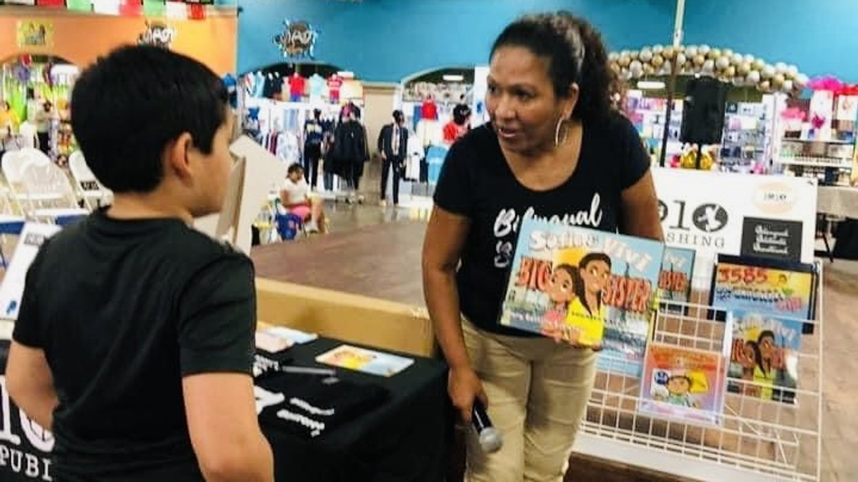 Woman talking about a book with a young boy