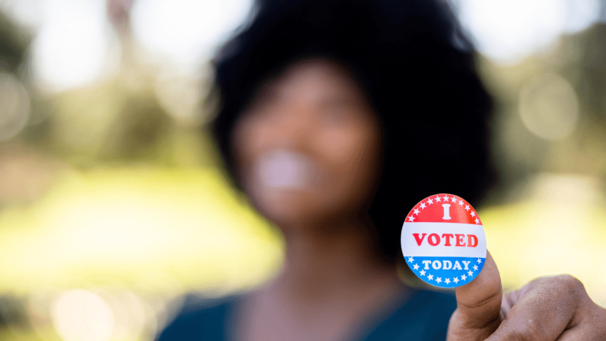woman with i voted sticker