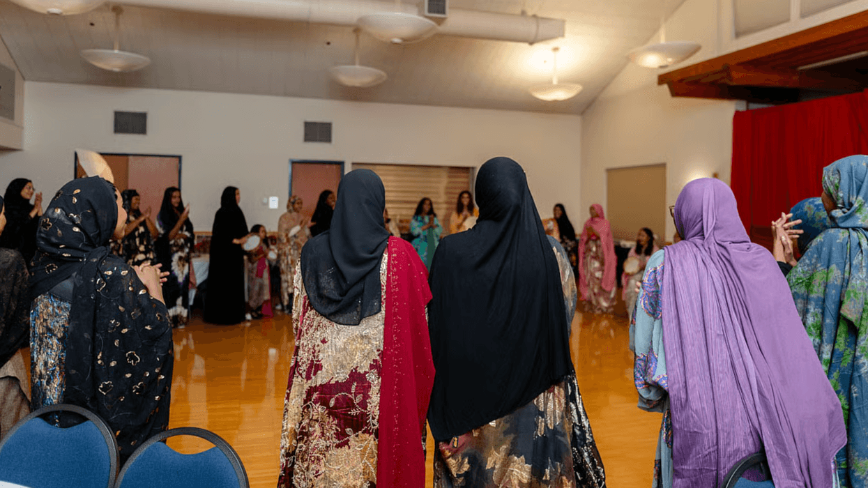 Women gathered in circle.