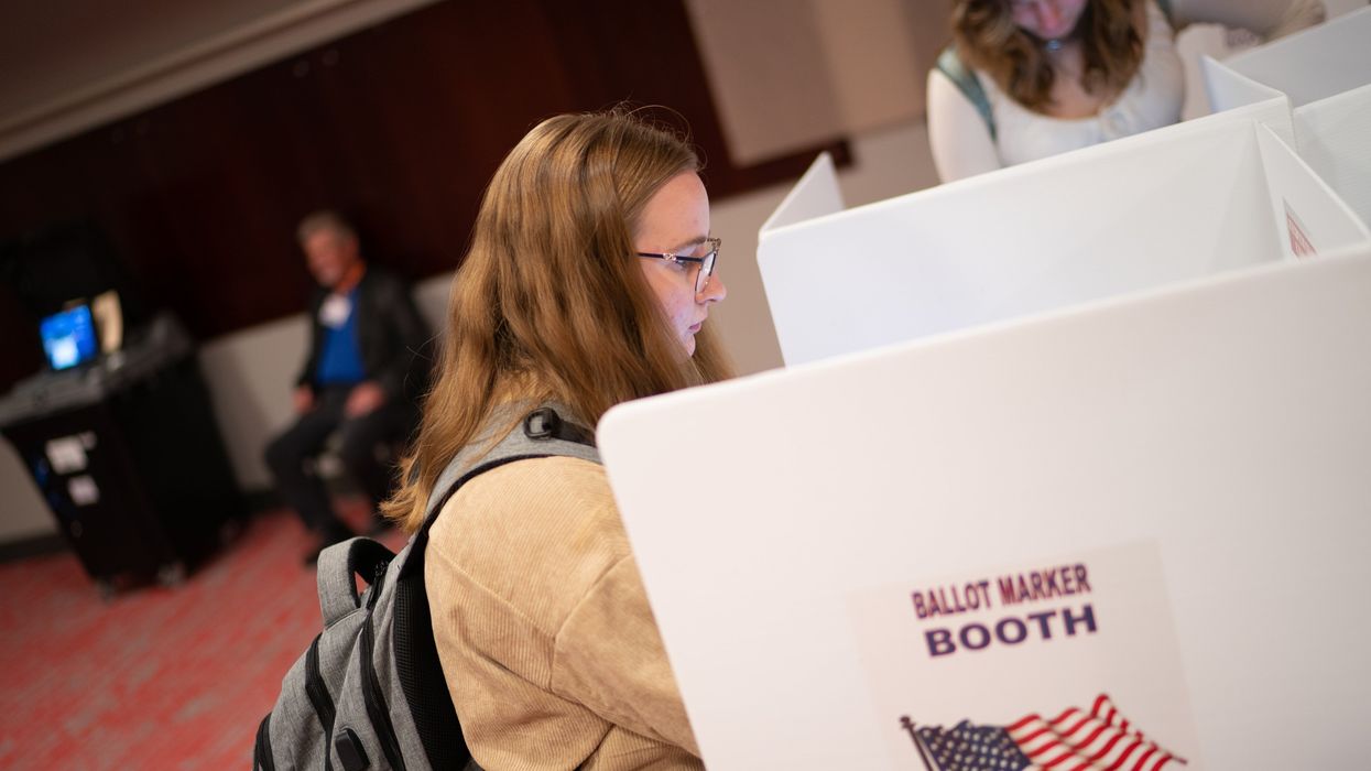 Young woman voting